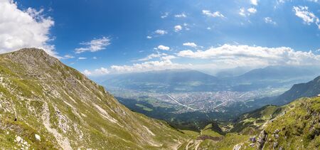 Panoramic aerial view of Innsbruck in a beautiful summer day, Austriaの写真素材