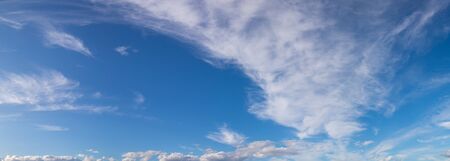 Blue sky with white clouds in a beautiful summer dayの写真素材