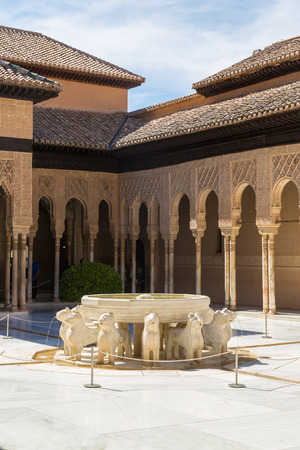GRANADA, SPAIN - JUNE 14, 2016: The Court of the Lions in Alhambra palace in Granada in a beautiful summer day, Spain on June 14, 2016のeditorial素材