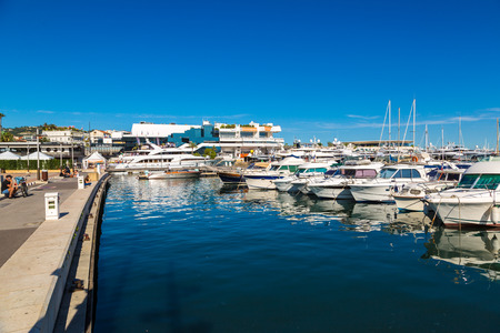 CANNES, FRANCE - JUNE 23, 2016: Yachts anchored in port in Cannes in a beautiful summer day, France on June 23, 2016のeditorial素材