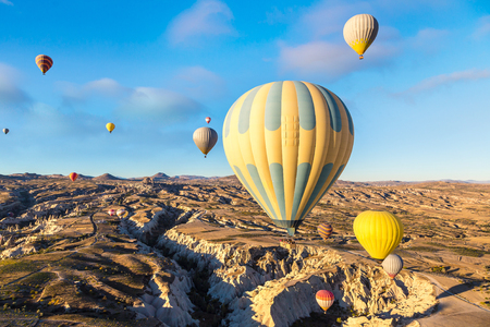 Hot air Balloons flight in Cappadocia, Nevsehir, Turkey in a beautiful summer dayの写真素材