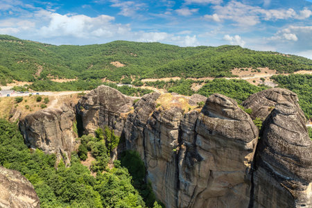 Monasteries on the top of rock in a beautiful summer day  in Meteora, Greeceの写真素材