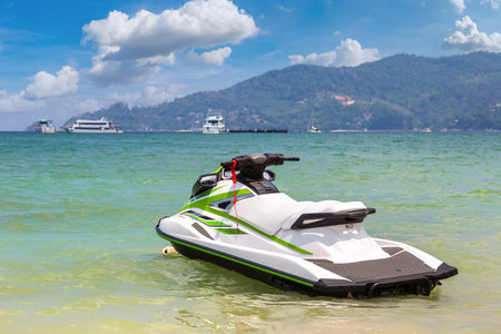 Jet ski on Patong beach and Andaman sea on Phuket in Thailand in a summer day