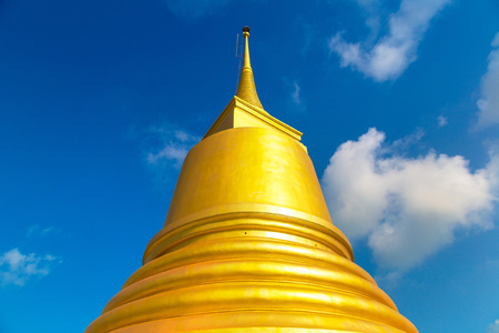 Golden stupa, Khao Hua Chuk Temple on Koh Samui island, Thailand in a summer dayの写真素材
