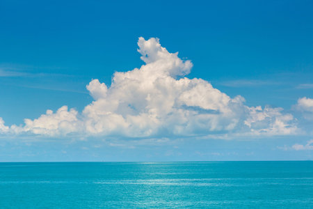 Clouds over sea in a summer dayの写真素材