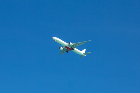 Airplane in the sky in a summer day