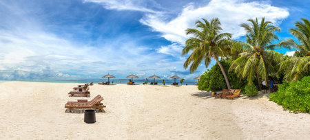 Panorama of Wooden sunbed on tropical beach in the Maldives at summer dayのeditorial素材