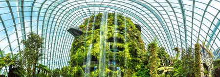 SINGAPORE - JUNE 23, 2018: Panorama of Waterfall in the Conservatory Cloud Forest Dome in Singapore at summer dayのeditorial素材