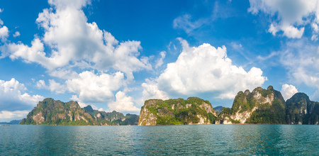 Panorama of Beautiful nature at Cheow Lan lake, Ratchaprapha Dam, Khao Sok National Park in Thailand in a summer dayの写真素材