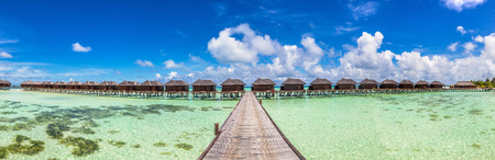 Panorama of Water Villas (Bungalows) at Tropical beach in the Maldives at summer dayの写真素材