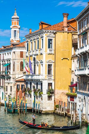 VENICE, ITALY - JUNE 18, 2014: Gondola on Canal Grande in Venice, in a beautiful summer day in Italy on June 18のeditorial素材