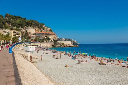 NICE, FRANCE - JUNE 21, 2016: Public beach in Nice in a beautiful summer day, France on June 21, 2016のeditorial素材