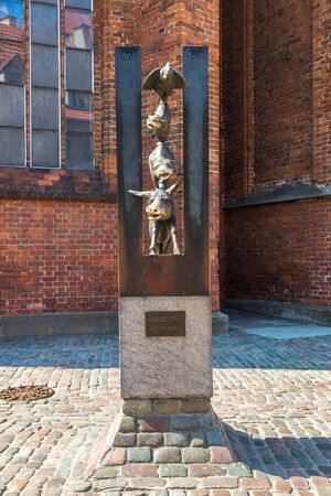 RIGA, LATVIA - JUNE 13, 2016: Monument of Bremen town musicians in Riga in a beautiful summer day, Latviaのeditorial素材