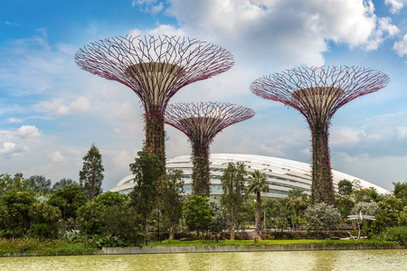 SINGAPORE - JUNE 23, 2018: The Supertree Grove at Gardens by the Bay and Greenhouse in Singapore near Marina Bay Sands hotel at summer dayのeditorial素材