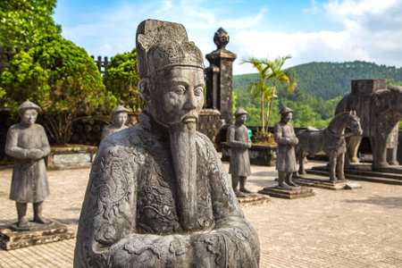 Tomb of Khai Dinh with Manadarin hnour guard in Hue, Vietnam in a summer day