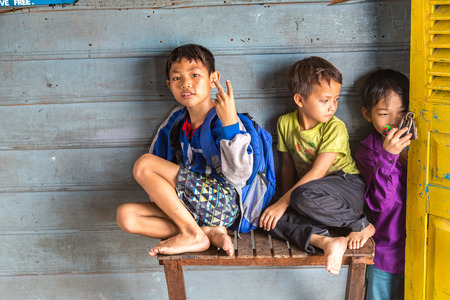 CHONG KHNEAS, CAMBODIA - JUNE 11, 2018: Cambodian students in floating school in Chong Khneas floating village near Siem Reap, Cambodiaのeditorial素材