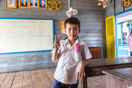 CHONG KHNEAS, CAMBODIA - JUNE 11, 2018: Cambodian student in floating school in Chong Khneas floating village near Siem Reap, Cambodiaのeditorial素材