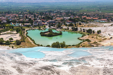 Travertine pools and terraces in Pamukkale, Turkey in a beautiful summer dayの写真素材