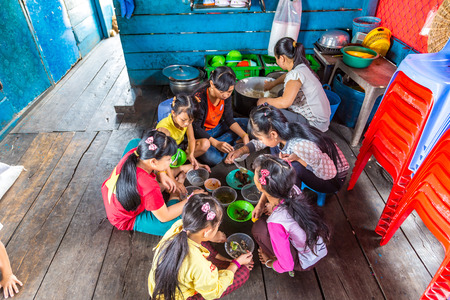 CHONG KHNEAS, CAMBODIA - JUNE 11, 2018: Cambodian students in floating school in Chong Khneas floating village near Siem Reap, Cambodiaのeditorial素材