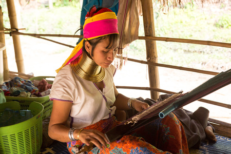 CHIANG RAI, THAILAND - MARCH 29, 2018: Portrait of a long neck woman in village near Chiang Rai, Thailand in a summer dayのeditorial素材