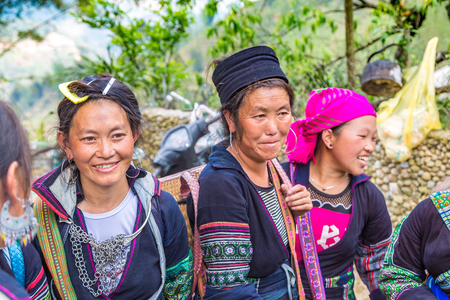 SAPA, VIETNAM - JUNE 19, 2018: Woman wearing traditional clothes at Terraced rice field in Sapa, Lao Cai, Vietnam in a summer dayのeditorial素材