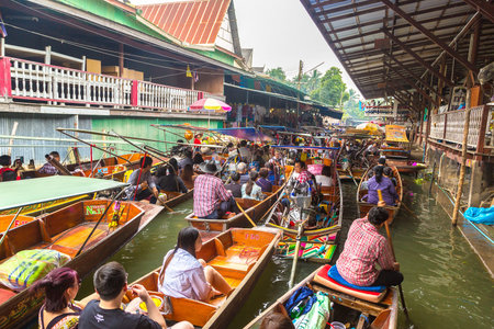 BANGKOK, THAILAND - MARCH 22, 2018: Floating market in Thailand in a summer day