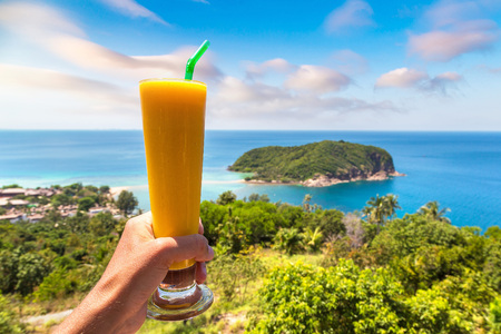 Fresh organic Mango shake in restaurant on Koh Phangan island, Thailand in a summer dayの写真素材