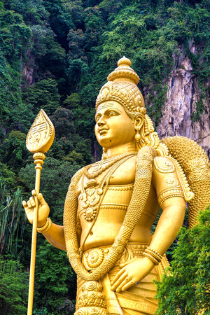 Statue of hindu god Murugan at Batu cave in Kuala Lumpur, Malaysia at summer dayのeditorial素材