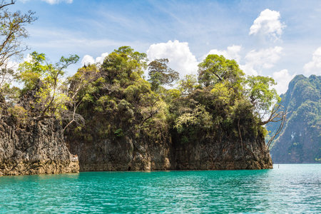 Beautiful nature at Cheow Lan lake, Ratchaprapha Dam, Khao Sok National Park in Thailand in a summer...