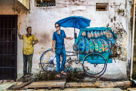 PENANG, MALAYSIA - FEBRUARY 22, 2020: Mural graffiti in Georgetown on Penang island, Malaysiaのeditorial素材