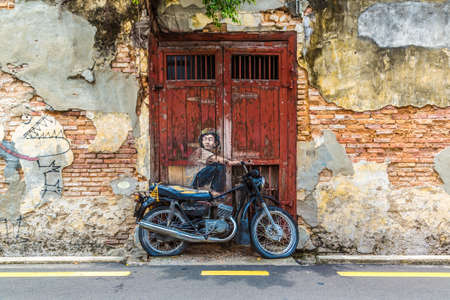 PENANG, MALAYSIA - FEBRUARY 22, 2020: Mural graffiti in Georgetown on Penang island, Malaysiaのeditorial素材