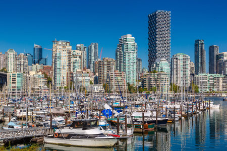 VANCOUVER, CANADA - APRIL 2, 2020: Landscape of false creek in a sunny day in Vancouver, Canada