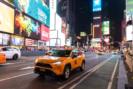 NEW YORK CITY, USA - MARCH 15, 2020: Times Square at night is a symbol of New York City, USA