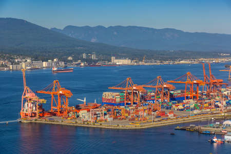 VANCOUVER, CANADA - APRIL 2, 2020: Panoramic aerial view of Vancouver Centerm Terminal - Container port terminal in a sunny day, Canadaのeditorial素材