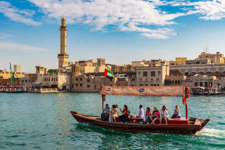 DUBAI, UAE - APRIL 5, 2020: Abra - old traditional wooden boat on the bay Creek in Dubai, United Arab Emiratesのeditorial素材