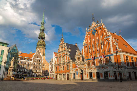 RIGA, LATVIA - JUNE 13, 2016: House of the Blackheads and Saint Peters church in Riga in a beautiful summer day, Latviaのeditorial素材