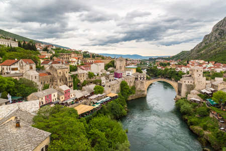 MOSTAR, BOSNIA - HERZOGOVINA - JUNE 28, 2016: The Old Bridge in Mostar in a beautiful summer day, Bosnia and Herzegovinaのeditorial素材