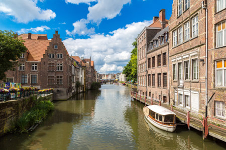 GENT, BELGIUM - JUNE 14, 2016: Canal in the old town in Gent in a beautiful summer day, Belgium