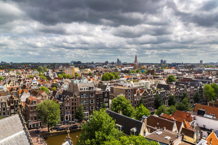 AMSTERDAM, THE NETHERLANDS - JUNE 16, 2016: Panoramic aerial view of Amsterdam in a beautiful summer day, The Netherlandsのeditorial素材