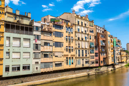 GIRONA, SPAIN - JUNE 26, 2016: Colorful houses in Girona, in a beautiful summer day, Catalonia, Spainのeditorial素材
