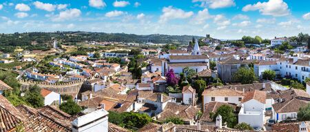 Panoramic aerial view of medieval town Obidos in a beautiful summer day, Portugalの写真素材
