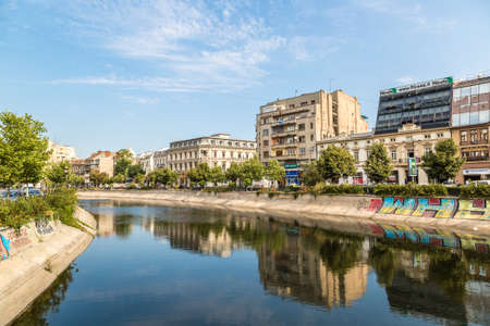 BUCHAREST, ROMANIA - JUNE 15, 2015: Dambovita river in a summer day in Bucharest, Romaniaのeditorial素材