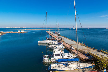 ODESSA, UKRAINE - AUGUST 23, 2017: Cargo container terminal port in Odessa, Ukraine in a beautiful...