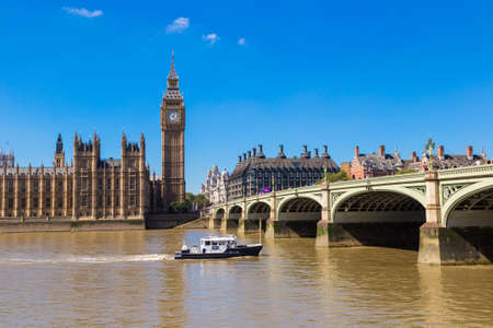 LONDON, UNITED KINGDOM - JUNE 14, 2016: The Big Ben, the Houses of Parliament and Westminster bridge in London in a beautiful summer day, England, United Kingdomのeditorial素材