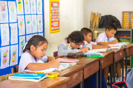 BANGKOK, THAILAND - MARCH 22, 2018: Thai schoolchildren in uniform in Thailand in a summer dayのeditorial素材