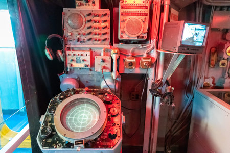 NEW YORK CITY, USA - MARCH 29, 2020: Green military radar screen at  aircraft carrier USS Intrepid...