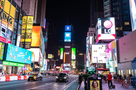 NEW YORK CITY, USA - MARCH 15, 2020: Times Square at night is a symbol of New York City, USA