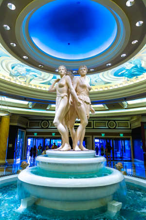 LAS VEGAS, USA - MARCH 29, 2020: Golden statues on top of fountain at the lobby of Caesars Palace Las Vegas Hotel and Casino in Las Vegas, Nevada, USAのeditorial素材