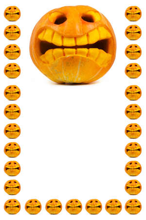 Halloween pumpkin with hat and leaf isolated on whiteの写真素材