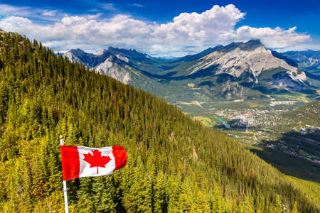 Canadian flag and Panoramic aerial view of  Bow Valley in Banff national park, Canadian Rockiesの写真素材